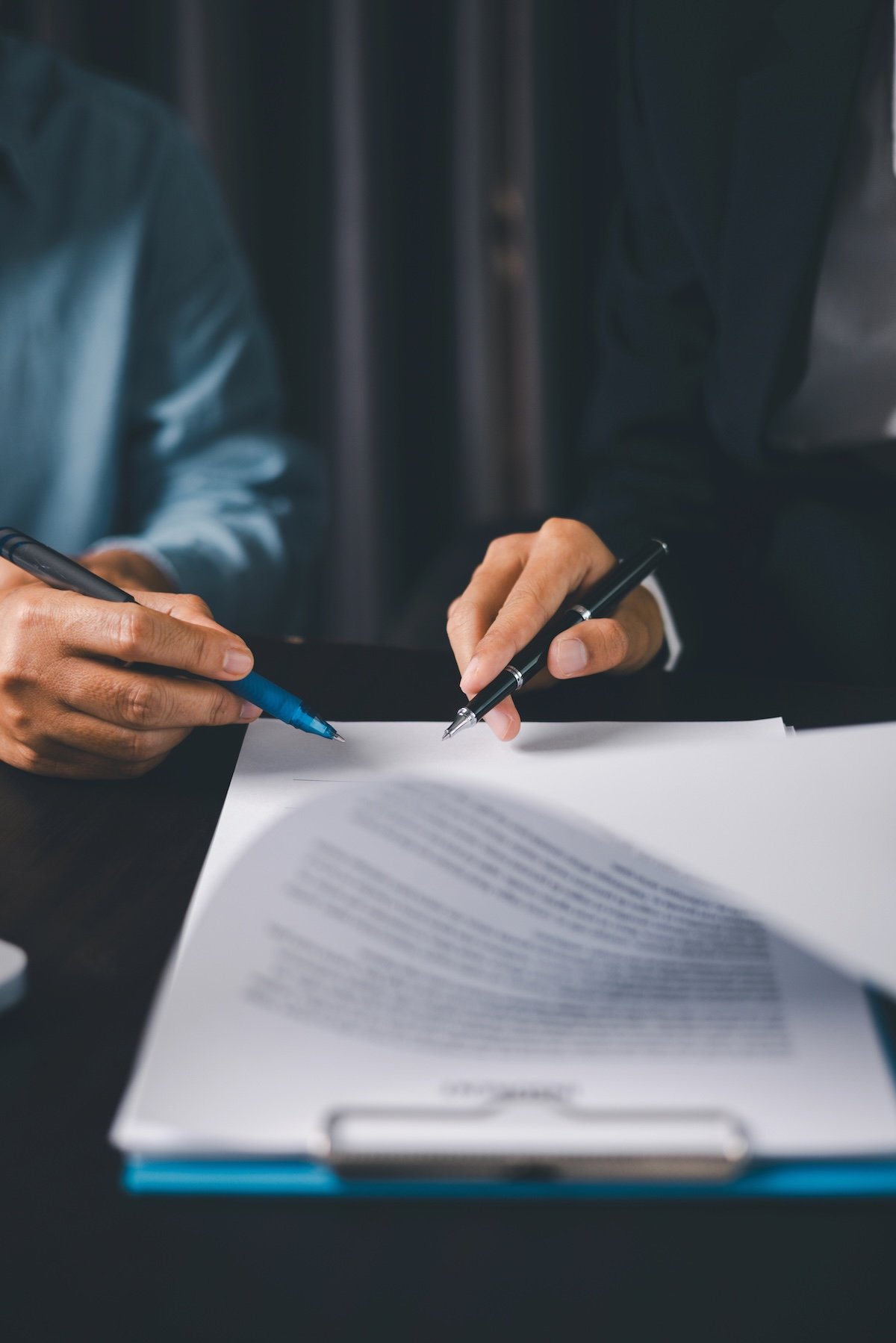 business-people-signing-contract business-people-signing-contract